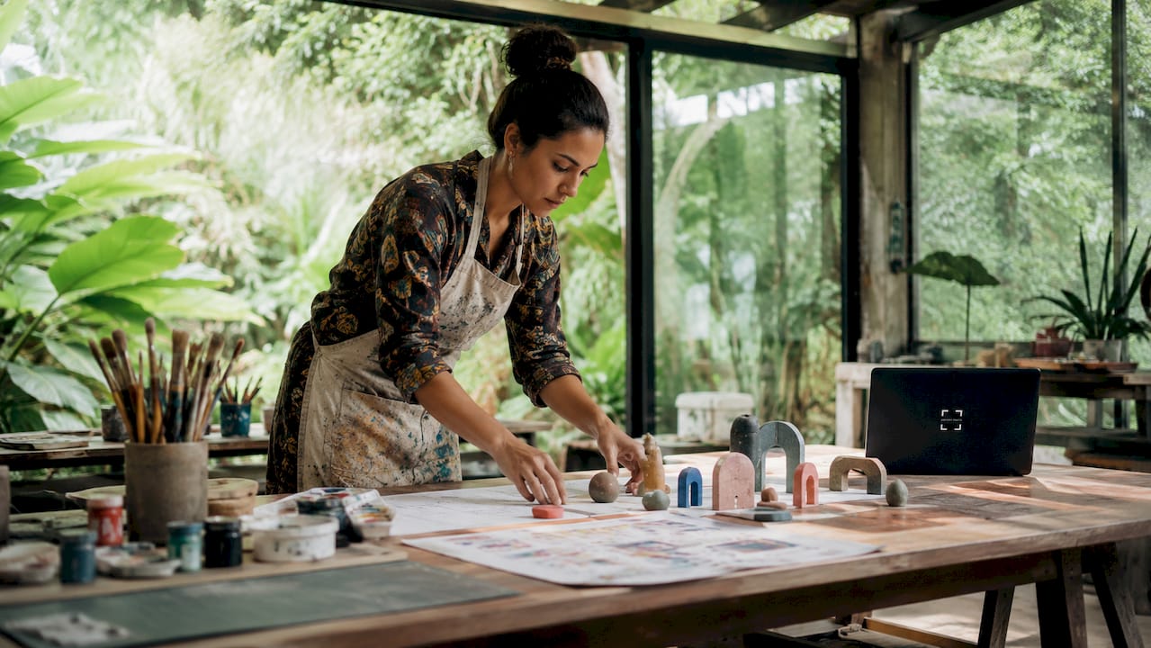 Female artist planning art installation layout